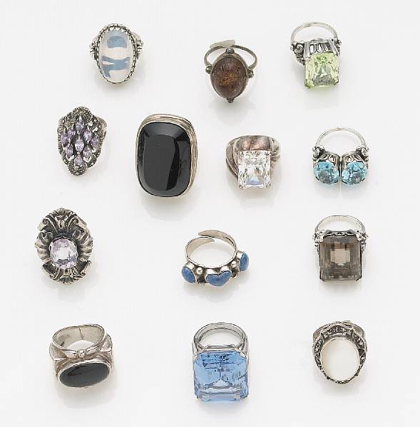 Appraisal: A collection of thirteen gem-set and silver rings