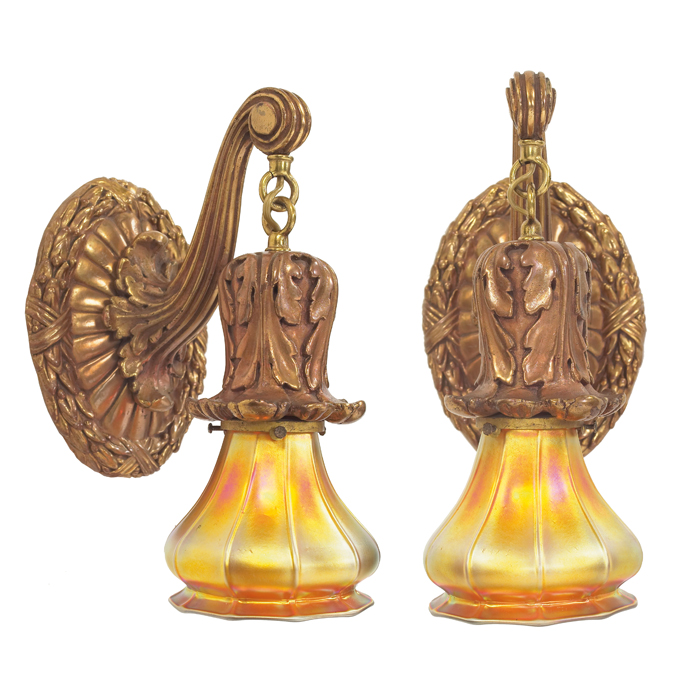 Appraisal: Arts and Crafts sconces pair with Steuben shades deeply carved