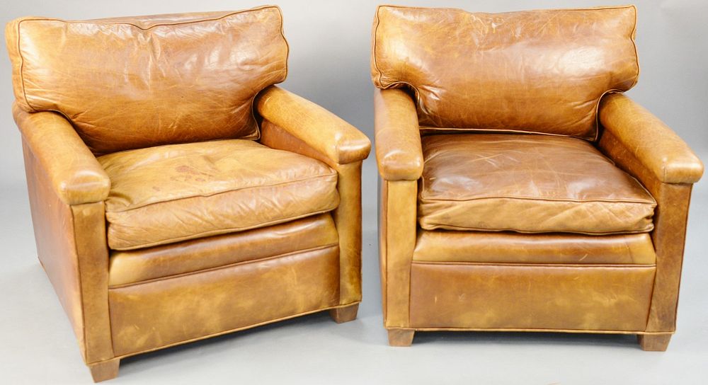 Appraisal: Pair of brown leather easy chairs ht in wd in