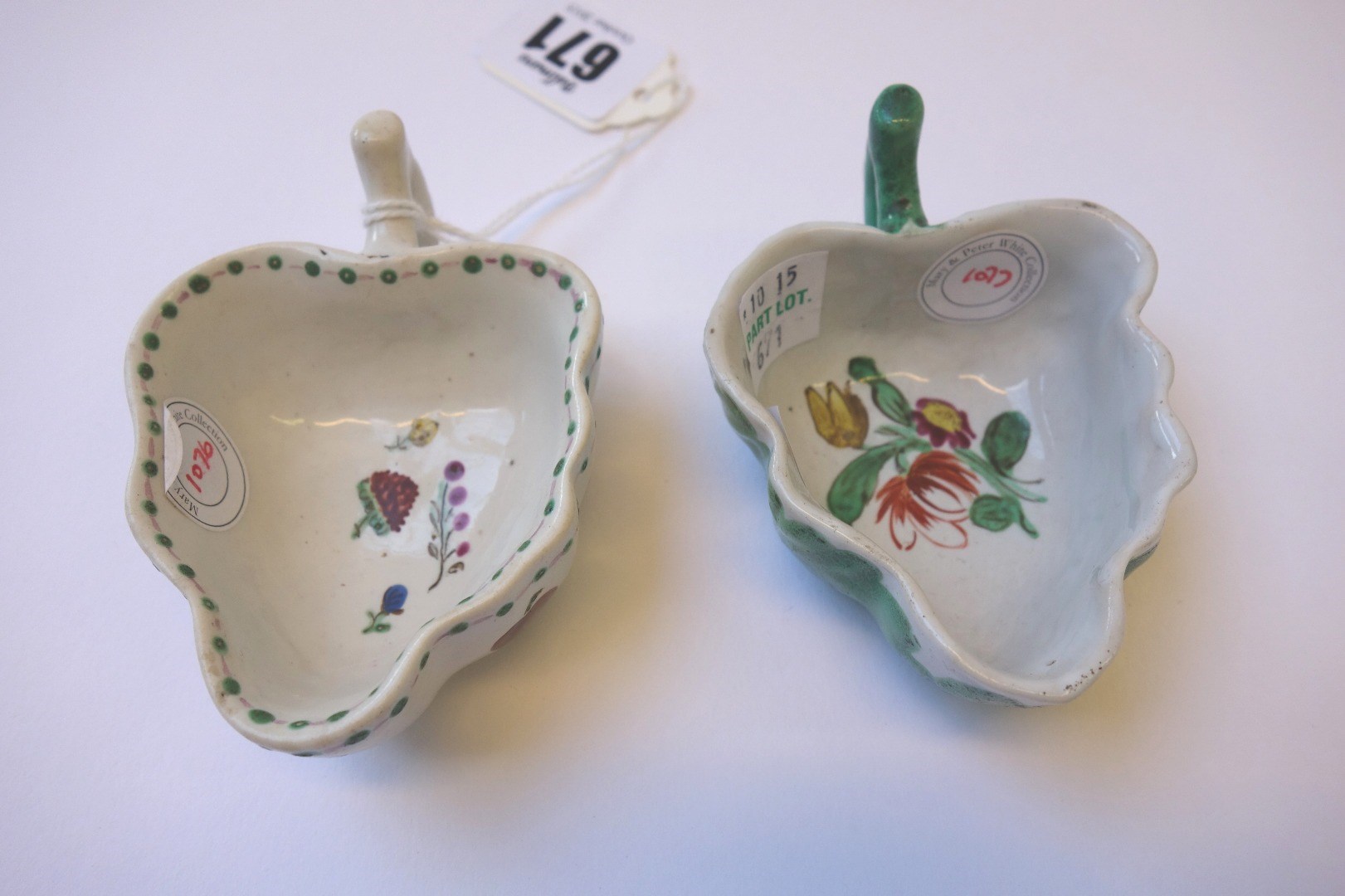 Appraisal: Two Doccia leaf shaped pickle dishes circa one with tin