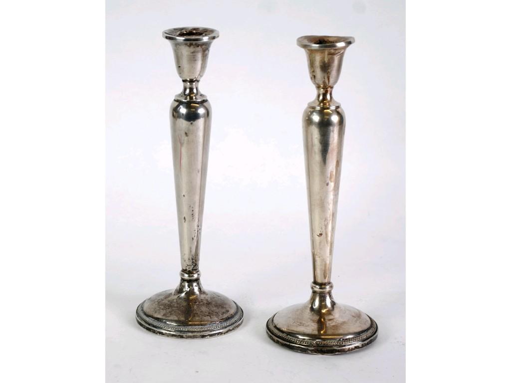 Appraisal: PAIR OF STERLING SILVER TABLE CANDLESTICKS by F B Rogers