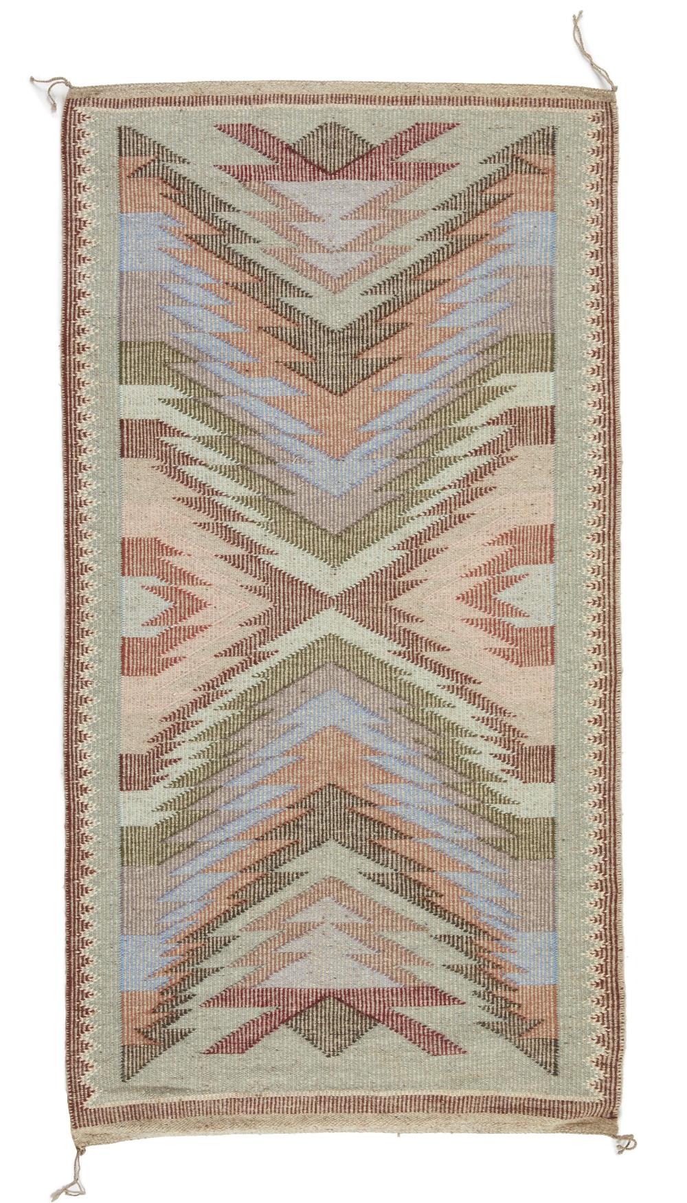 Appraisal: A Navajo regional raised outline rug by Susie Yazzie th