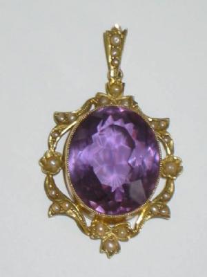 Appraisal: A VICTORIAN AMETHYST AND SEED PEARL PENDANT having oval cut