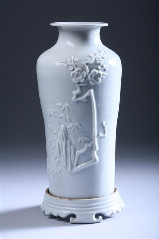 Appraisal: CHINESE BLANC-DE-CHINE PORCELAIN VASE Qing Dynasty Molded with flowering prunus