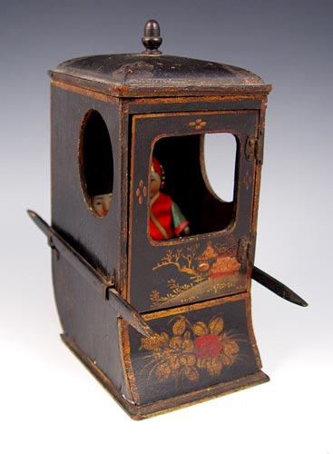 Appraisal: MINIATURE CHINESE BRIDAL SEDAN WITH DOLLS Handpainted and decorated wood