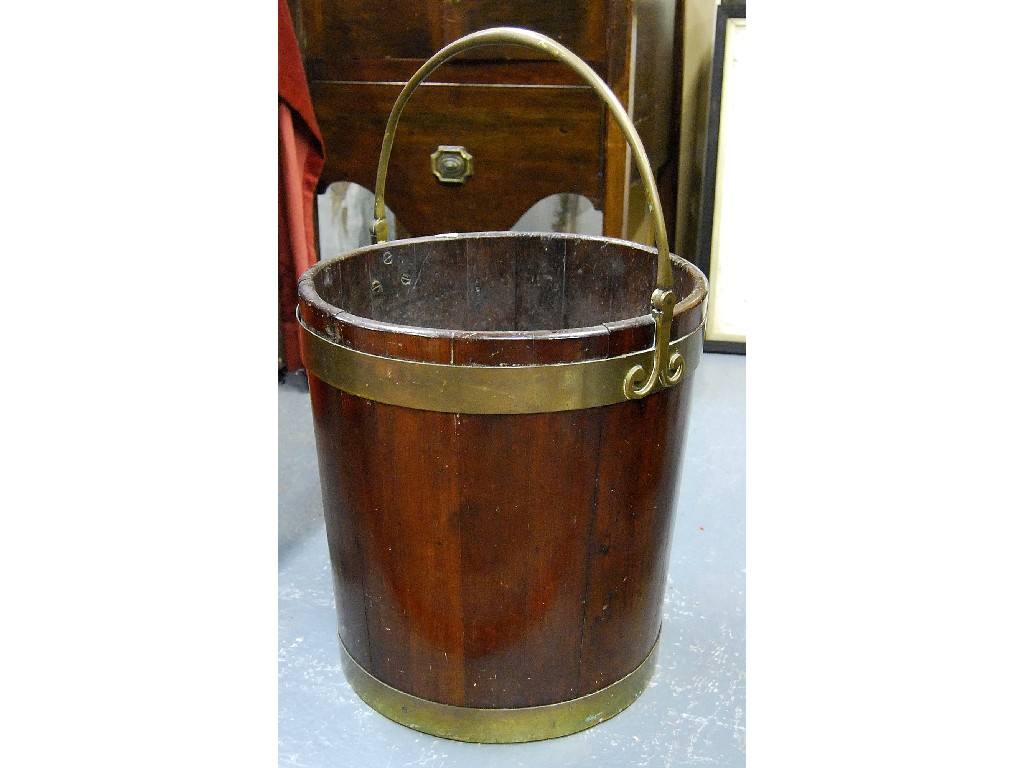 Appraisal: A th century Irish brass bound mahogany peat bucket having