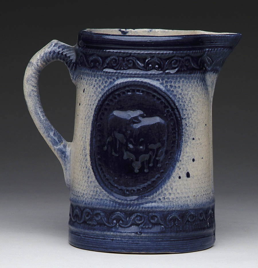 Appraisal: FINE BLUE AND WHITE STONEWARE PITCHER WITH COWS Standard form