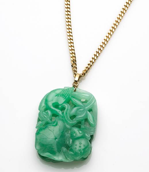 Appraisal: A carved jadeite jade pendant with k gold chain length