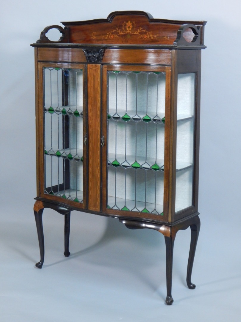 Appraisal: An Edwardian mahogany and marquetry display cabinet the arched raised