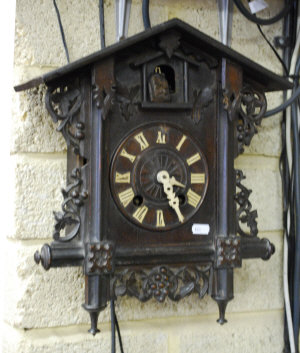 Appraisal: A late th century carved Black Forest cuckoo clock -incomplete