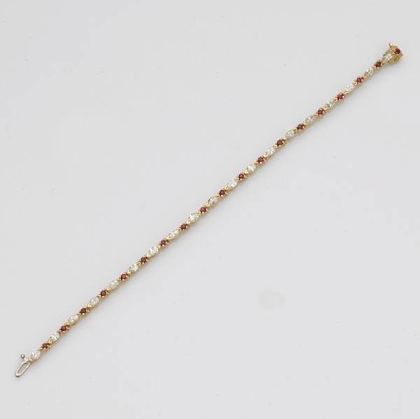 Appraisal: A diamond ruby and k gold bracelet estimated total diamond