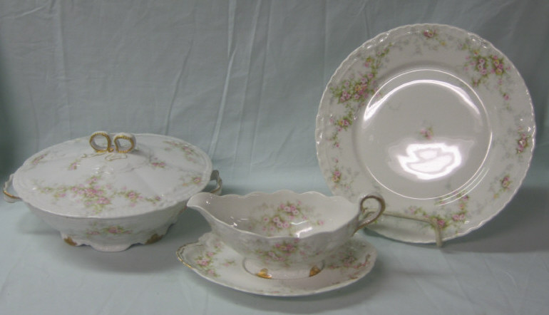 Appraisal: THEODORE HAVILAND LIMOGES FRANCE Porcelain dinner service floral pattern comprising