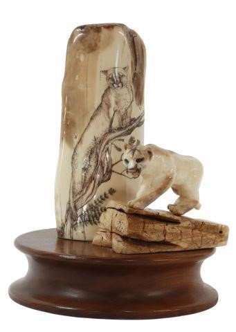 Appraisal: Scrimshaw fossilized walrus tusk polychrome depicting a mountain lion on