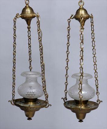 Appraisal: PAIR OF NEOCLASSICAL-STYLE GILT-METAL LANTERNS WITH ENGRAVED GLASS SHADES Each