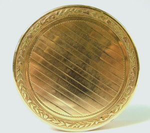 Appraisal: A French two-tone gold circular box and cover th century