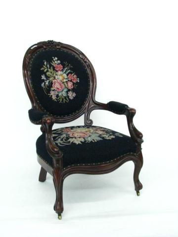 Appraisal: Victorian Style Carved Gents Chair Needlepoint upholstery