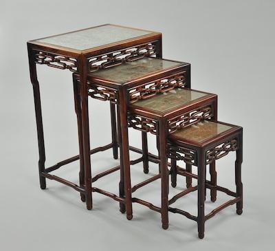 Appraisal: A Set of Four Carved Chinese Nesting Tables Apron carved