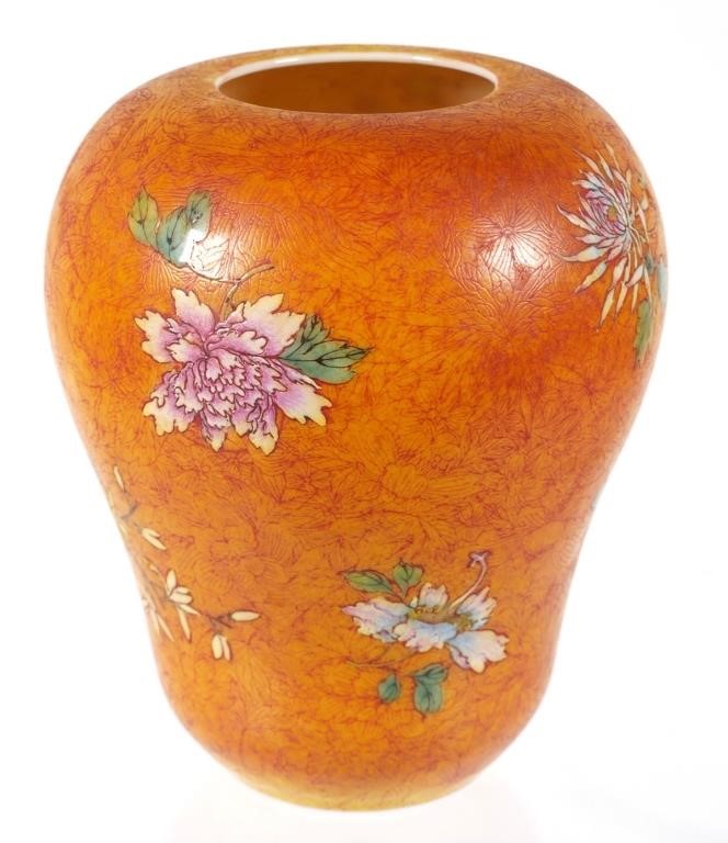 Appraisal: ANTIQUE CHINESE PORCELAIN FLORAL VASECeramic vase with a sgraffito surface