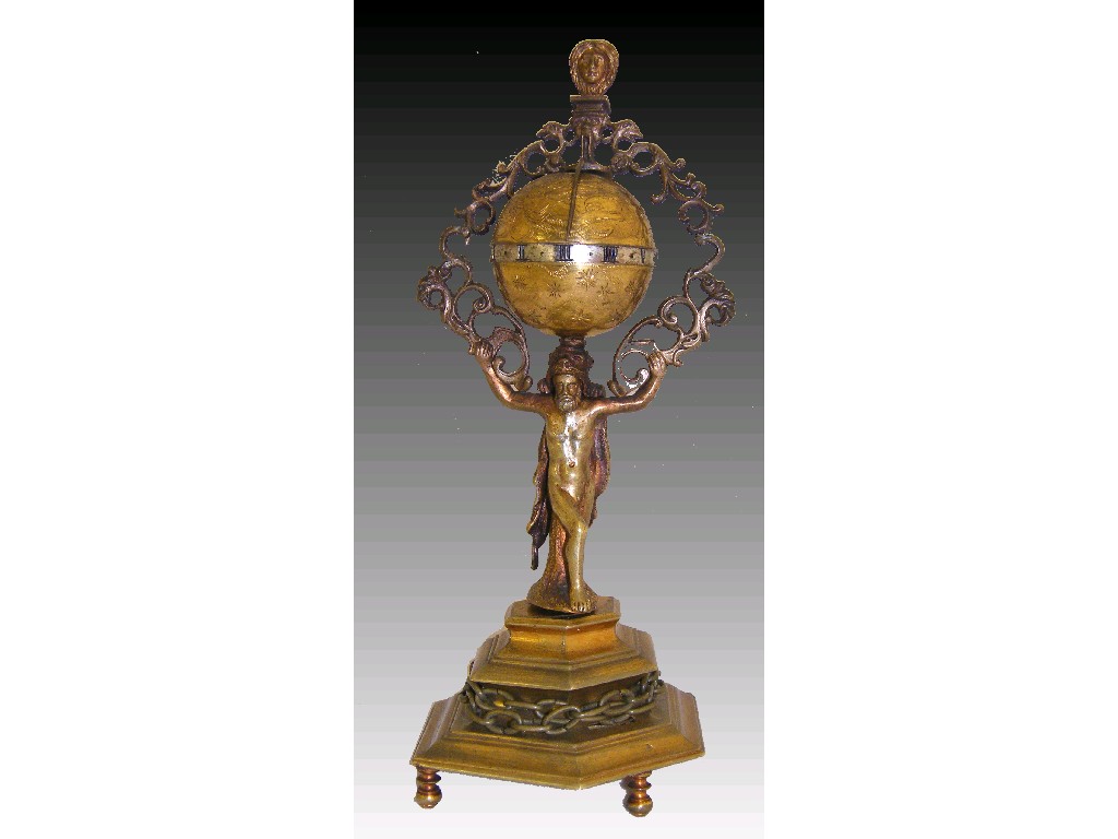 Appraisal: Small ormolu globe clock the globe engraved with figures and