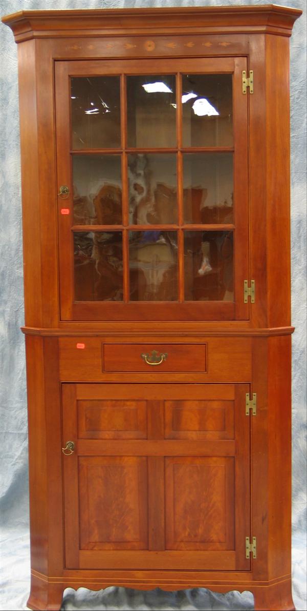 Appraisal: Inlaid cherry pc pane corner cupboard by Marshall Brinton bellflower