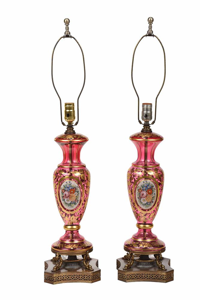 Appraisal: Pair of Bohemian Style Cranberry Glass Lamps th century converted