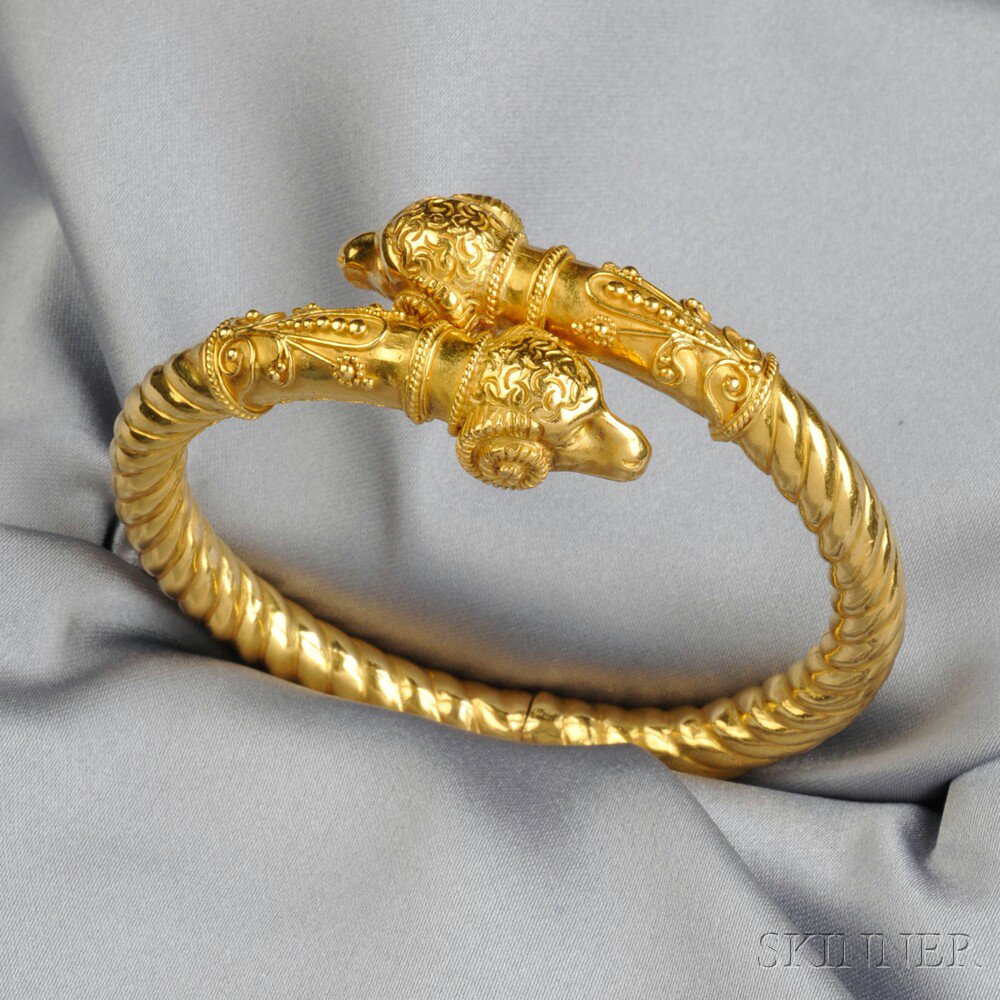 Appraisal: kt Gold Ram's Head Bracelet the hinged ropetwist bangle with