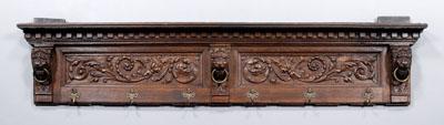 Appraisal: Victorian lion carved coat rack three lion mask carvings centering