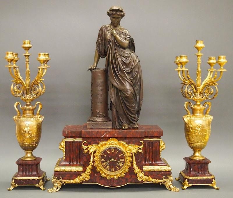 Appraisal: French Mantel clock and candelabra A th century French bronze