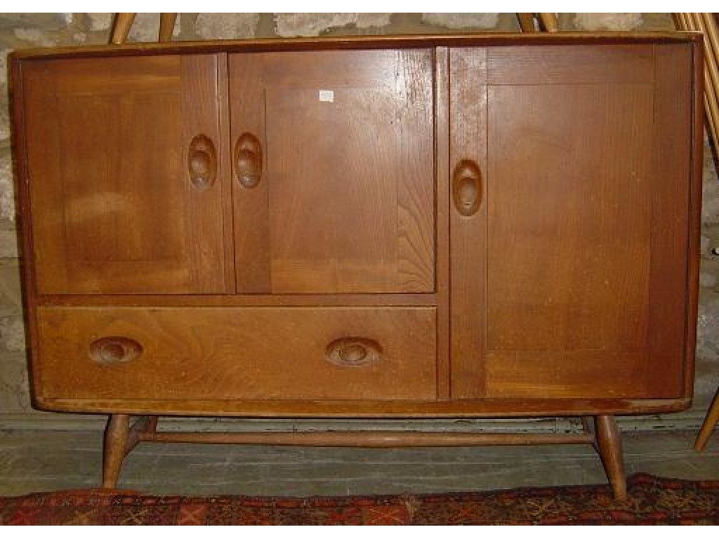 Appraisal: An 'Ercol' light elm sideboard dresser base enclosed by an