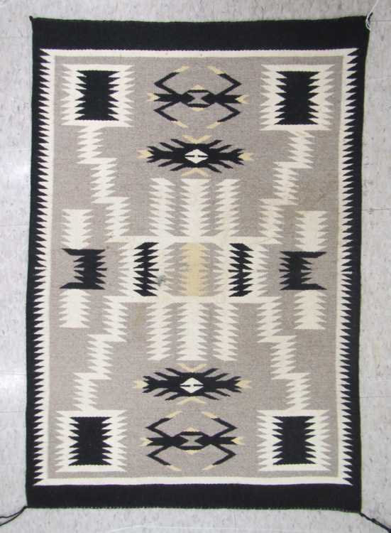 Appraisal: NAVAJO WEAVING SAMPLER fine woven mat with black grey beige