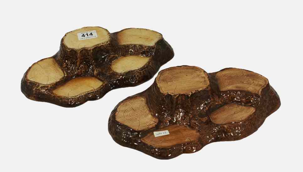 Appraisal: Beswicvk Beatris Potter Tree Trunk Display Stands