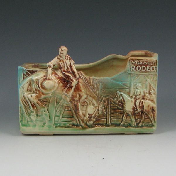 Appraisal: McCoy Wild West Rodeo planter with a cowboy on a