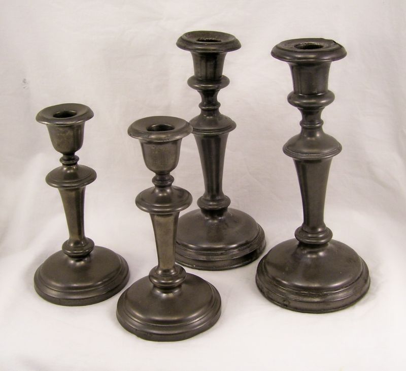 Appraisal: - Pair of Pewter Candlesticks Similar candlesticks one pair measures