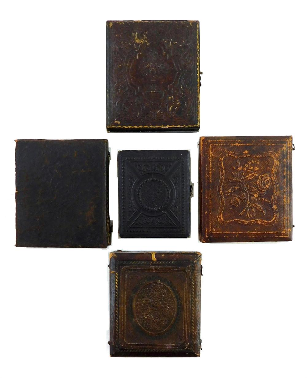 Appraisal: Early photography five leather cased daguerreotypes details include two portraits