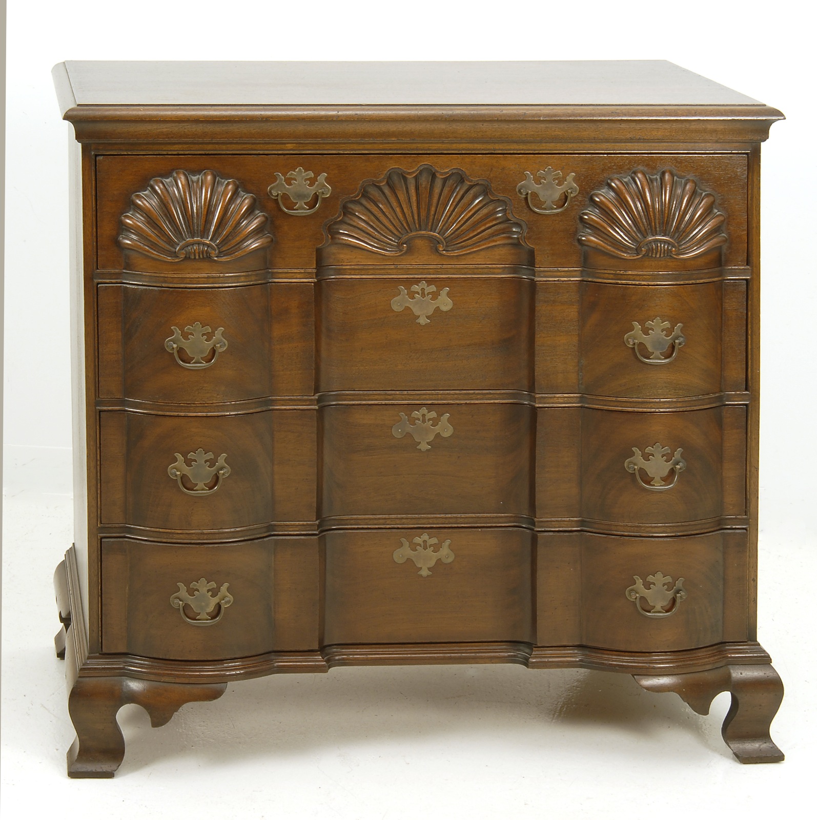 Appraisal: CHIPPENDALE-STYLE FOUR-DRAWER BUREAU In mahogany with Newport-style block and shell