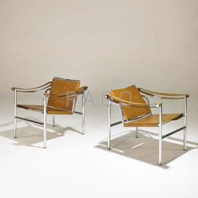 Appraisal: LE CORBUSIER Pair of Basculant armchairs s Saddle leather chromed