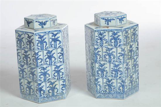 Appraisal: PAIR OF COVERED JARS China mid th century porcelain Paneled