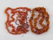 Appraisal: A mixed lot comprising an amber necklace and a coral