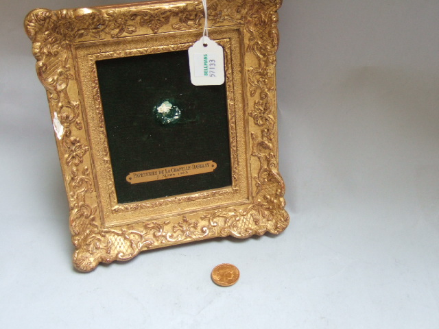 Appraisal: A French gold twenty francs probably with a rectangular gilt