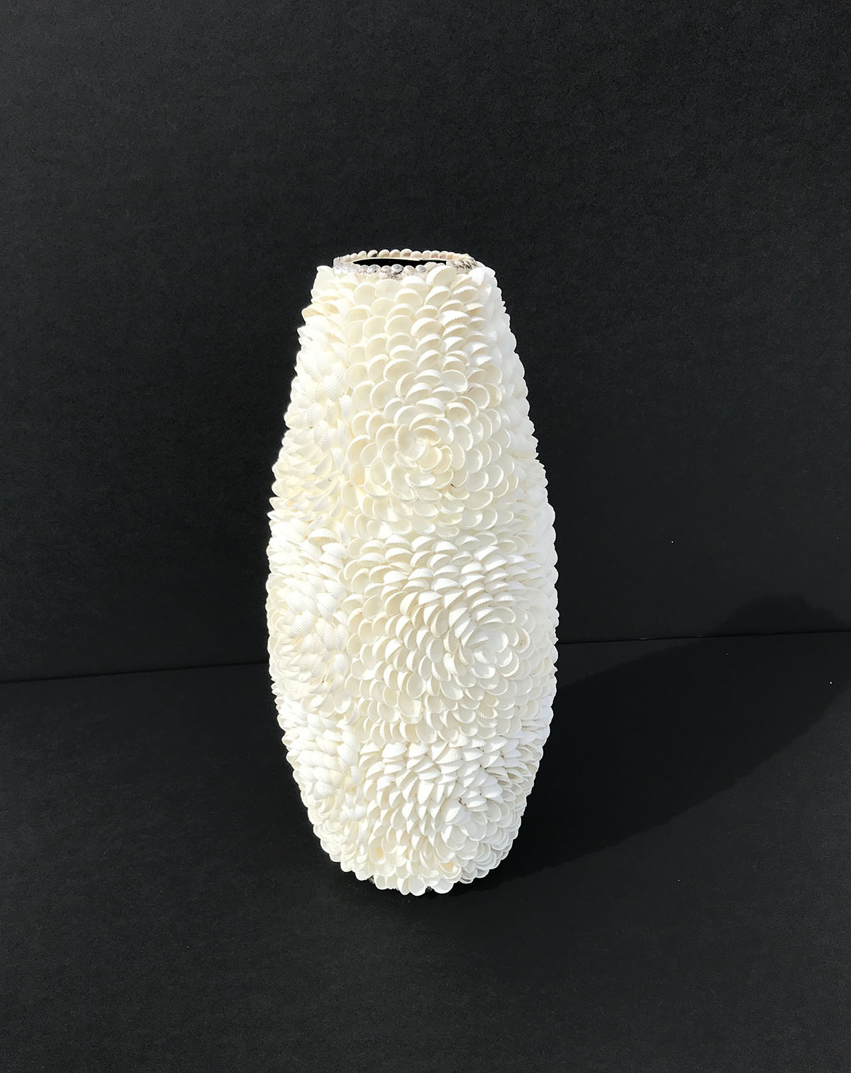 Appraisal: TALL SHELL ENCRUSTED VASE White seashell encrusted vase with snail