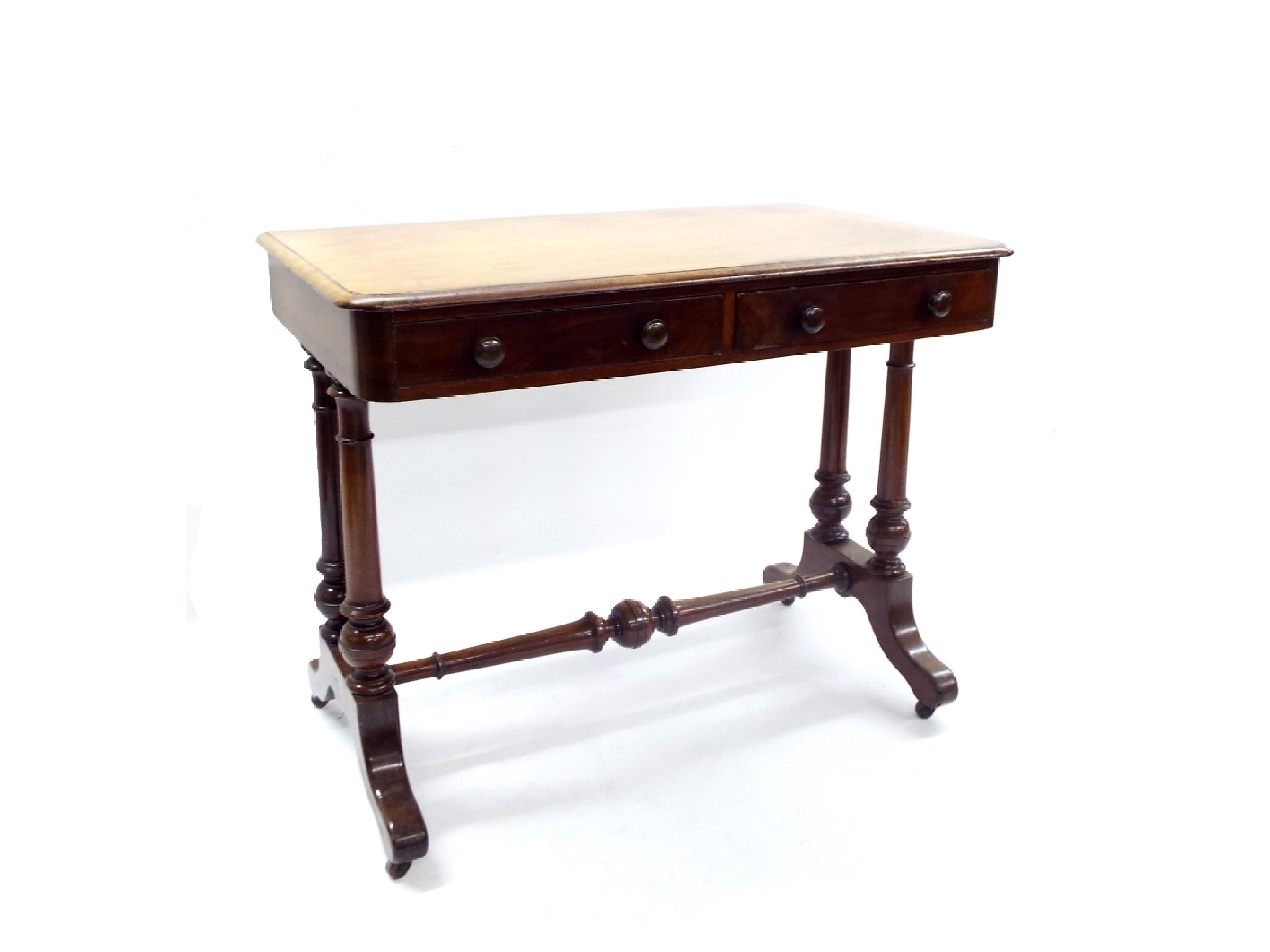 Appraisal: Victorian mahogany writing table the moulded top over two small