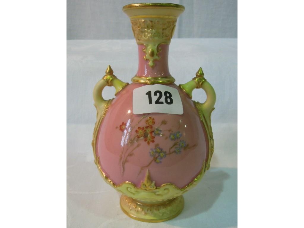 Appraisal: A pink ground Royal Worcester two handled vase with painted