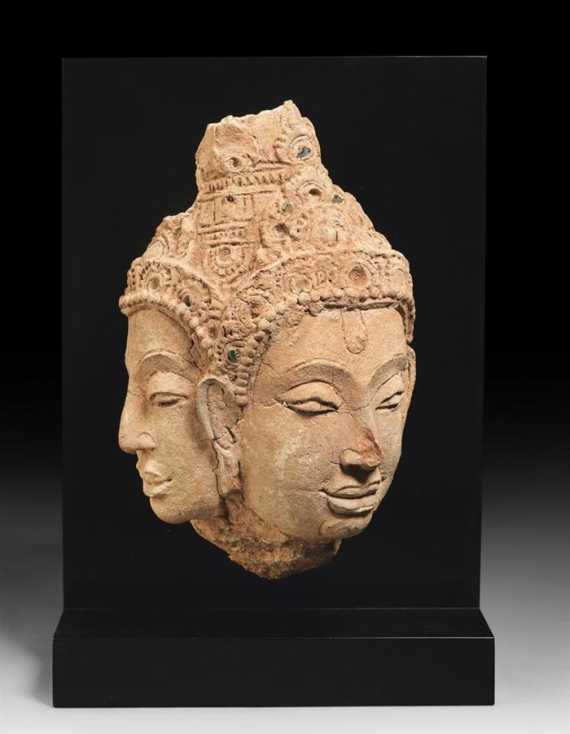 Appraisal: A TERRACOTTA HEAD OF A DOUBLE FACED DEITY Thailand Sukothai