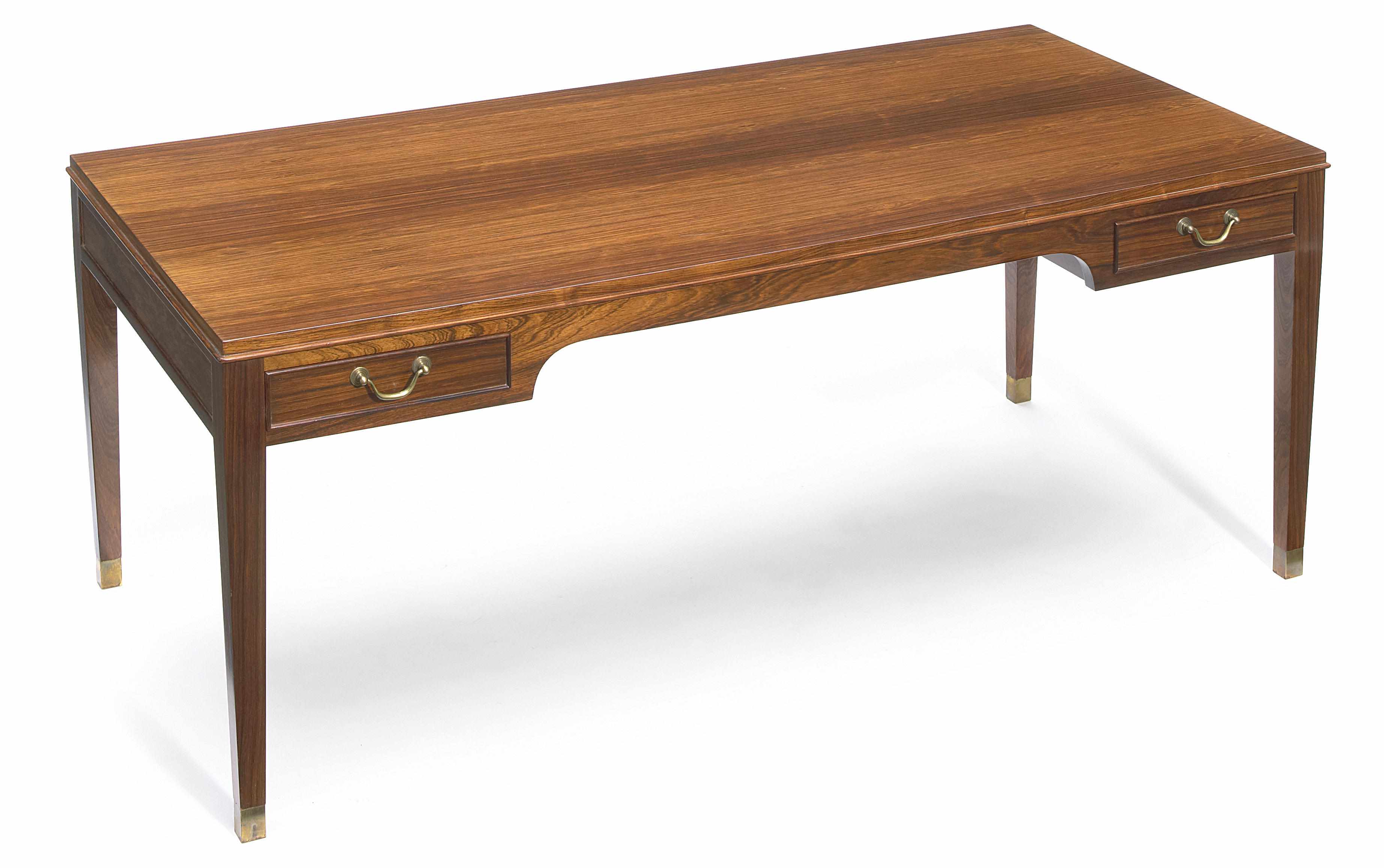 Appraisal: A Frits Henningsen rosewood and brass low table second quarter