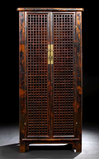 Appraisal: Unusual Chinese Distressed Black-Painted Storage Cabinet the tall body with