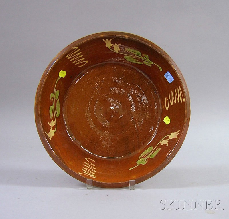 Appraisal: Glazed Slip Tulip Decorated Redware Bowl dia in