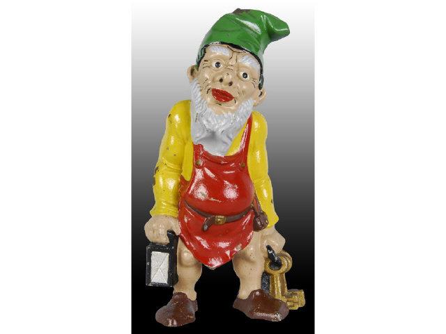 Appraisal: Gnome with Light Keys Cast Iron Doorstop Description Full-figure Marked