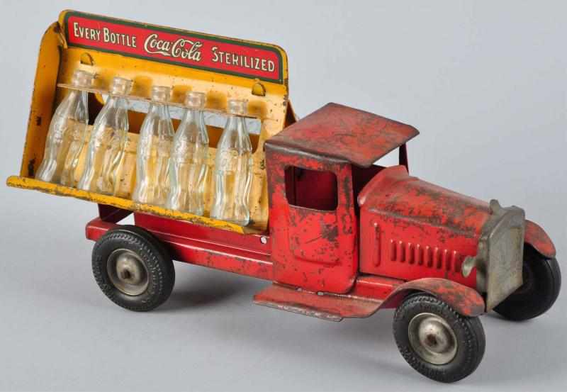 Appraisal: Metalcraft Coca-Cola Truck Toy Description With rubber tires Fairly heavy