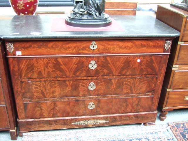 Appraisal: A th century mahogany and gilt mounted commode the fossilled