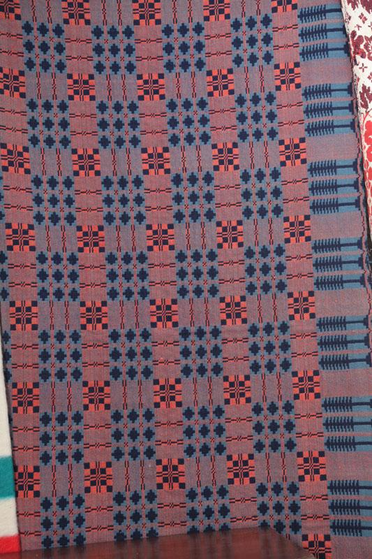 Appraisal: COVERLET Red dark blue and light blue with tree border